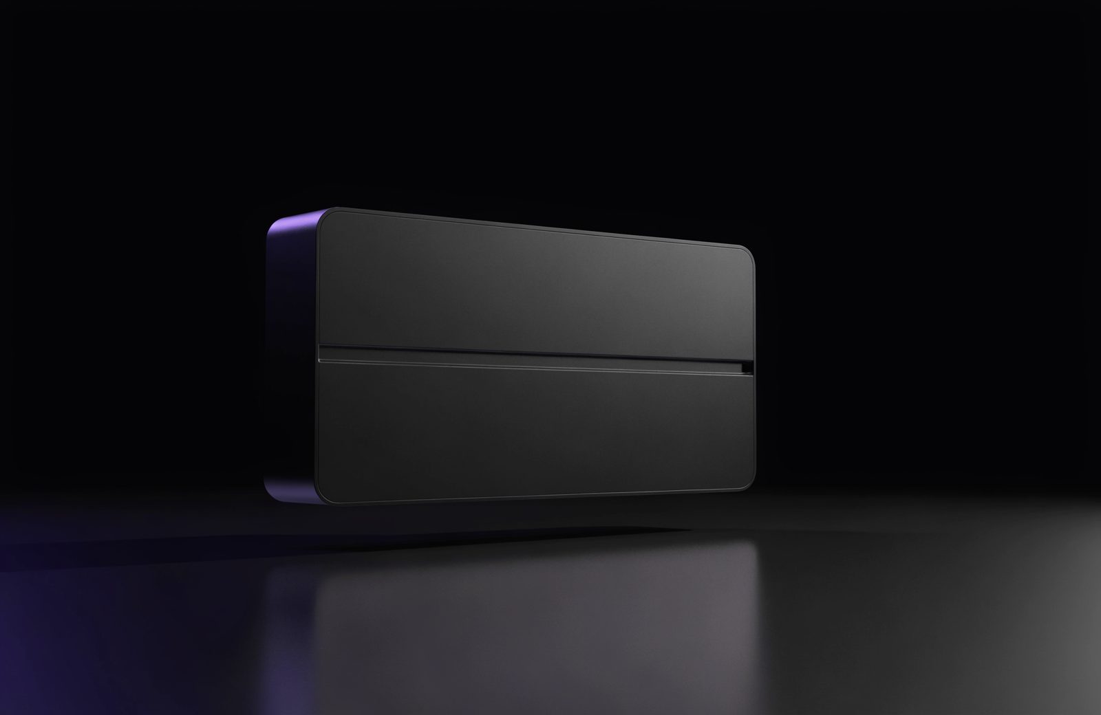 Matte black security appliance module lit by a violet rim light